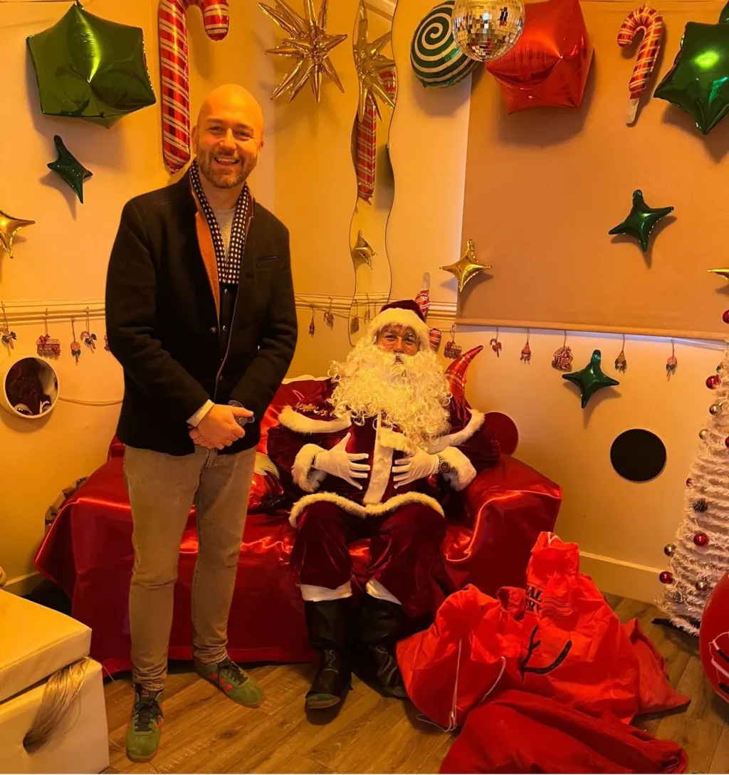 A.C.Knell pictured with Father Christmas